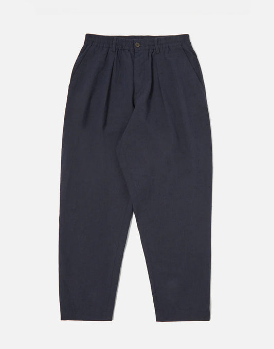 Universal Works Pleated Track Pant In Navy Lord Cotton Linen
