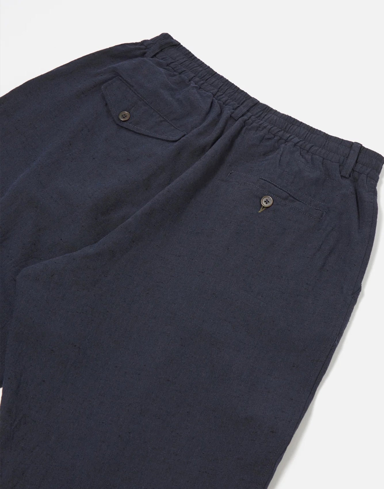 Universal Works Pleated Track Pant In Navy Lord Cotton Linen