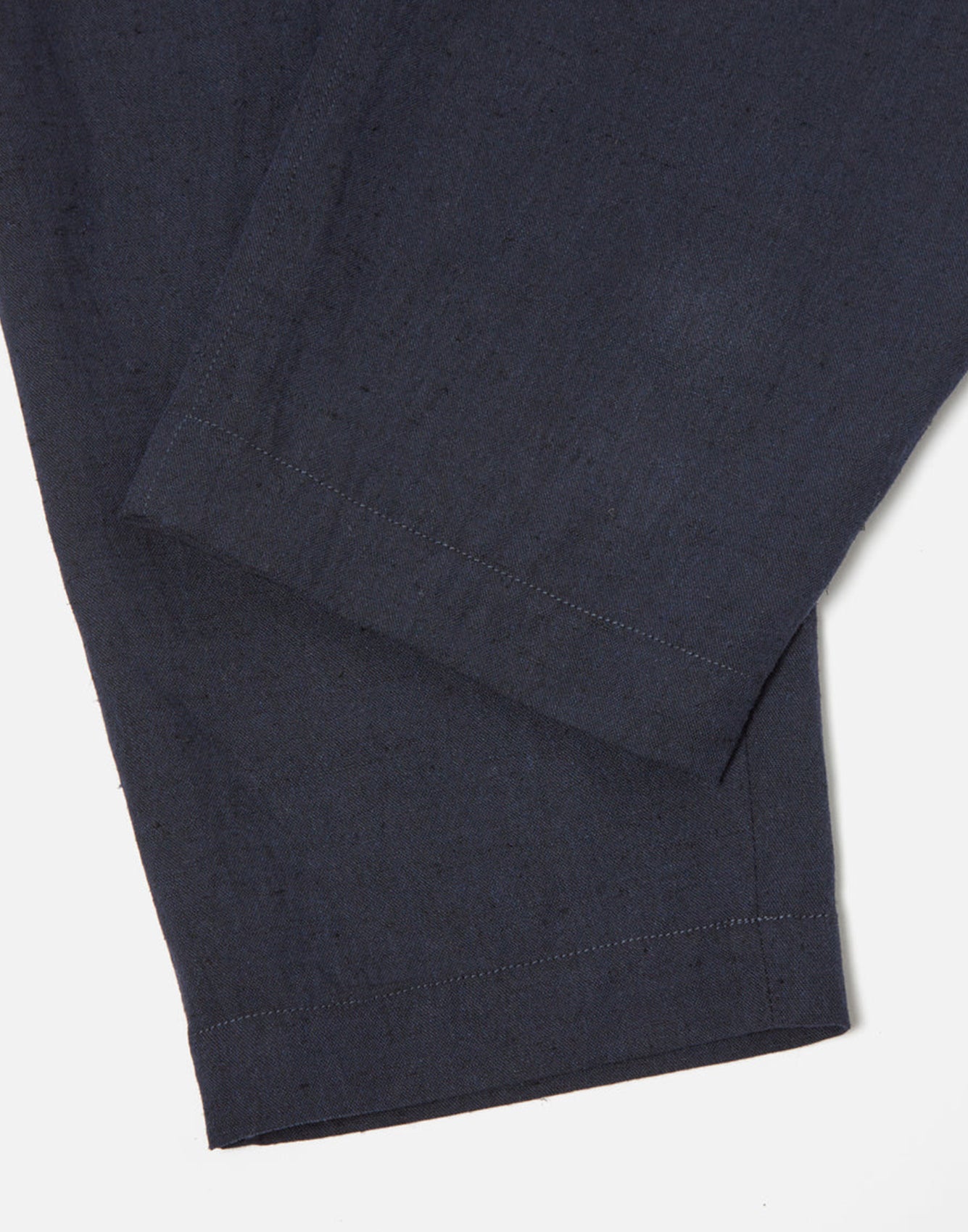 Universal Works Pleated Track Pant In Navy Lord Cotton Linen